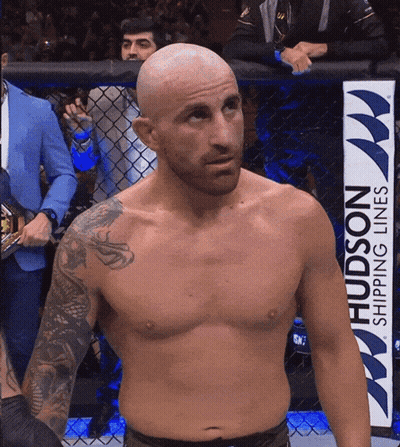 Shirtless Fighter In Front Of Hudson Shipping Line Sign GIF