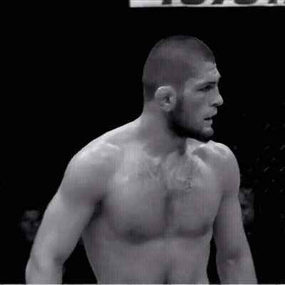 Shirtless Fighter With Toyota Sign GIF