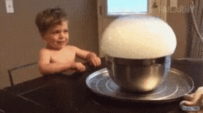 Shirtless Little Boy With Bowl Of Soap Bubbles GIF