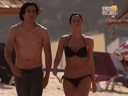 Shirtless Man and Woman in Bikini on Beach Praia Flores