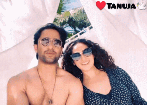 Shirtless Man And Woman Posing With Heart Saying Tanuja GIF