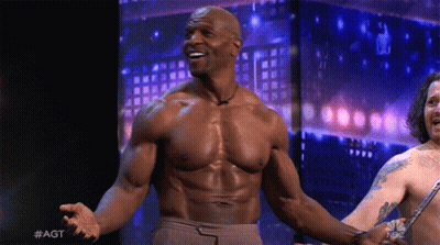 Shirtless Man Arms Outstretched While Another Holds Knife GIF