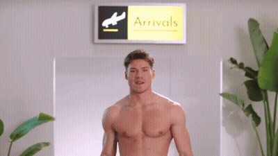 Shirtless Man At Airport Arrivals Sign GIF