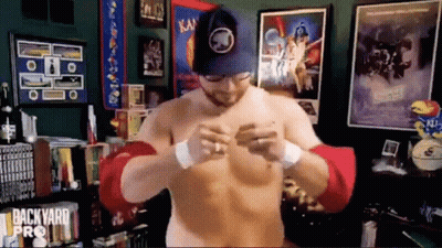 Shirtless Man At Backyard Pro Bookshelf GIF
