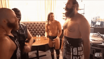 Shirtless Man At Dartboard Says Damn It Feels Good To Be Back GIF