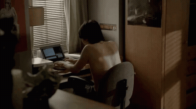 Shirtless Man At Desk With Laptop GIF
