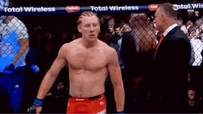 Shirtless Man At Fence With Total Wireless Banner GIF