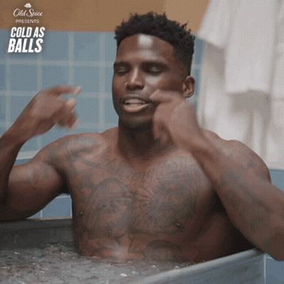 Shirtless Man Bathing In Old Spice Tub GIF
