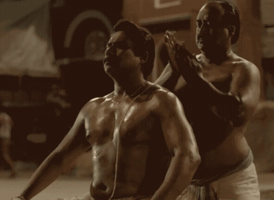Shirtless Man Being Massaged By Another Man GIF