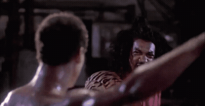 Shirtless Man Boxing In Dark Room GIF