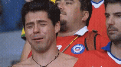 Shirtless Man Crying Wearing Chile Shirt GIF