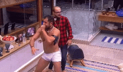 Shirtless Man Dancing In Bathroom Watched By Another GIF