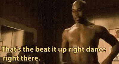 Shirtless Man Dancing In Dark Room GIF