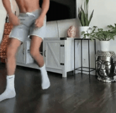 Shirtless Man Dancing In Living Room GIF