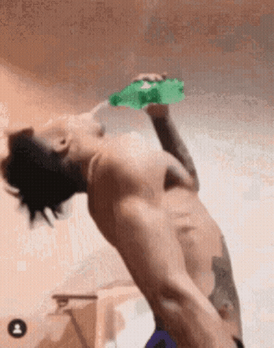 Shirtless Man Drinking Green Bottle GIF