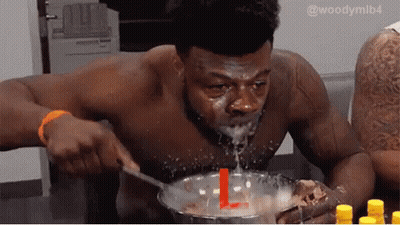 Shirtless Man Eating Bowl Of Food With Spoon GIF
