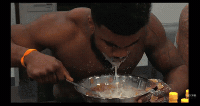 Shirtless Man Eating Cereal GIF