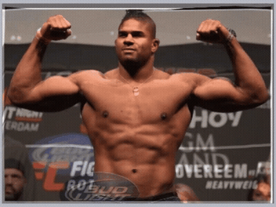 Shirtless Man Flexing Muscles GIF