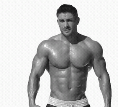 Shirtless Man Flexing Muscles GIF