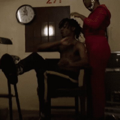 Shirtless Man Getting Haircut From Woman Clock 271 GIF