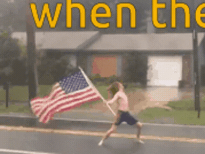 Shirtless Man Holding American Flag GIF