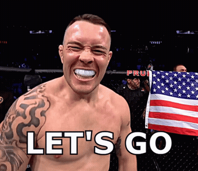 Shirtless Man Holding American Flag Saying Let's Go GIF