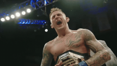 Shirtless Man Holding Championship Belt Screaming GIF