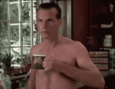 Shirtless Man Holding Coffee