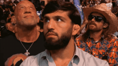 Shirtless Man Holding Colorful Flag Saying I Lost To Islam GIF
