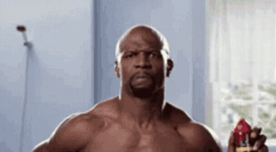 Shirtless Man Holding Spray Deodorant GIF