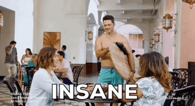 Shirtless Man Holding Surfboard Saying Insane GIF