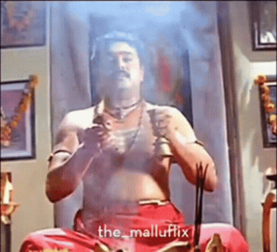 Shirtless Man Holding Sword At Mirror GIF