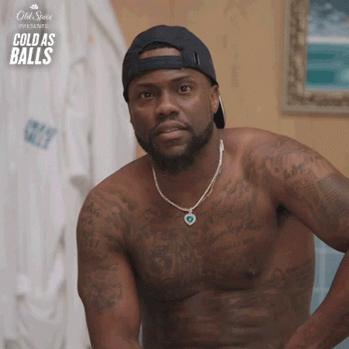 Shirtless Man In Baseball Cap And Necklace With Cold As Balls Sign GIF