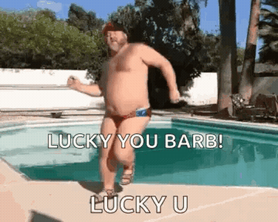 Shirtless Man In Bathing Suit Dancing By Pool GIF
