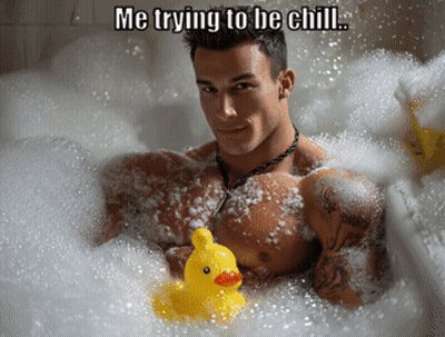 Shirtless Man In Bathtub With Yellow Rubber Duck GIF