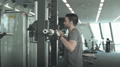 Shirtless Man In Black Shorts Arms In Air GIF