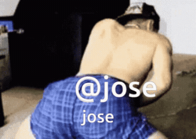 Shirtless Man In Blue Plaid Shorts Kneeling GIF