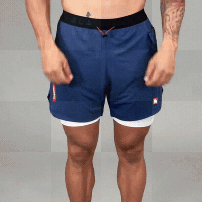 Shirtless Man In Blue Shorts With Red K GIF