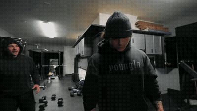 Shirtless Man In Blue Shorts With Red K GIF