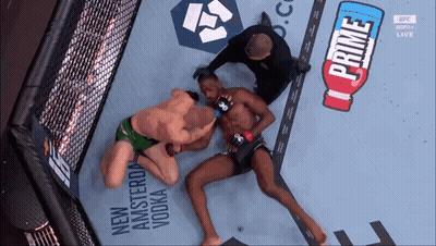 Shirtless Man In Cage With UFC Apex Sign GIF