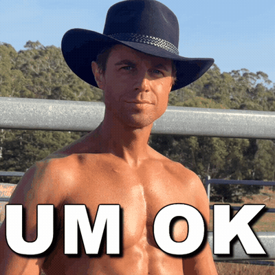 Shirtless Man In Cowboy Hat With Um Ok On Chest GIF