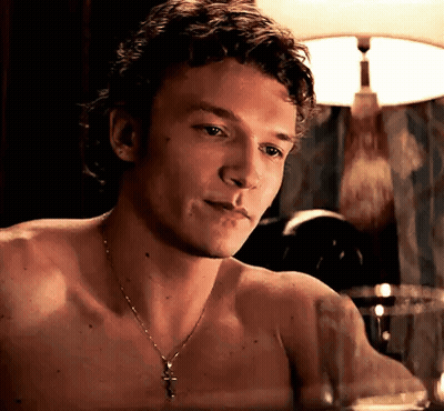 Shirtless Man In Cross Necklace Looking GIF