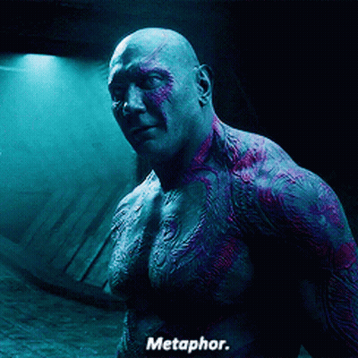 Shirtless Man In Dark Room Saying Metaphor GIF