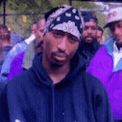 Shirtless Man In Front Of Crowd GIF