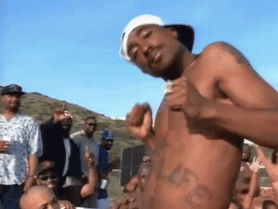 Shirtless Man In Front Of Crowd GIF