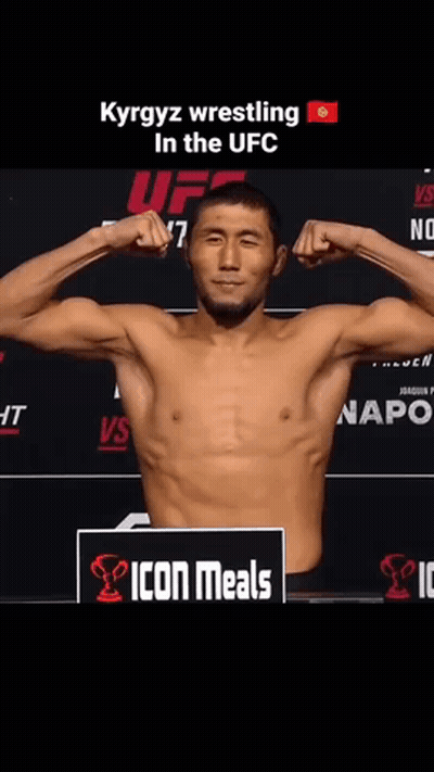 Shirtless Man In Front Of Icon Meals Sign GIF