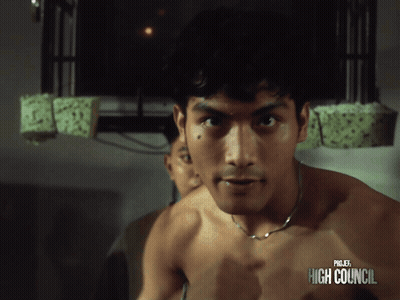 Shirtless Man In Front Of Project High Council Ad GIF