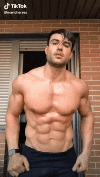 Shirtless Man In Front Of Wooden Lockers Number 105 GIF