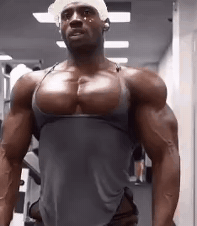 Shirtless Man In Gym Wearing Hat GIF