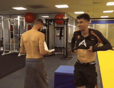 Shirtless Man In Gym With Letter A GIF